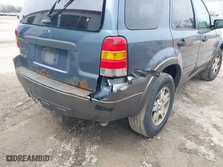 2005 Ford Escape XLT with VIN 1FMYU03145KA42335, listed as a IAAI auction lot 42110937 with 229,394 mi miles. Bid and sale history available at carsss.com. Image 12.