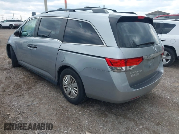 2016 Honda Odyssey LX with VIN 5FNRL5H23GB028338, listed as a IAAI auction lot 41980064 with 186,403 mi miles and . Bid and sale history available at DreamBid. Image 3.