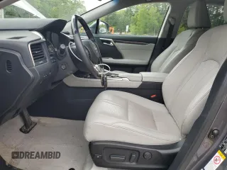 2016 Lexus RX 450h z VIN 2T2BGMCA0GC001306, wystawiony jako Copart lot #57262465 z przebiegiem 50 891 mil mil oraz Szkoda całkowita • Salvage title. Historia ofert i sprzedaży dostępna na DreamBid. Obrazek 7.