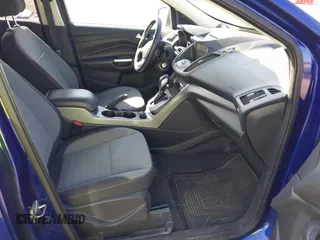 2014 Ford Escape SE with VIN 1FMCU9GX1EUB52373, listed as a IAAI auction lot 42163933 with 128,634 mi miles. Bid and sale history available at carsss.com. Image 5.