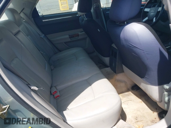 2005 Chrysler 300 with VIN 2C3AA63H65H522824, listed as a IAAI auction lot 42133787 with 266,724 mi miles. Bid and sale history available at carsss.com. Image 8.