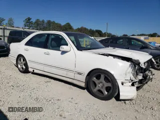 2001 Mercedes-Benz E-Class with VIN WDBJF70J11B285493, listed as a Copart auction lot 77170114 with 226,226 mi miles and Salvage Title. Bid and sale history available at carsss.com. Image 4.