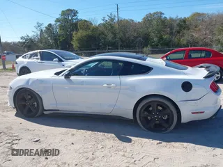 2022 Ford Mustang EcoBoost with VIN 1FA6P8TH5N5139871, listed as a IAAI auction lot 41290333 with 28,566 mi miles and . Bid and sale history available at DreamBid. Image 14.