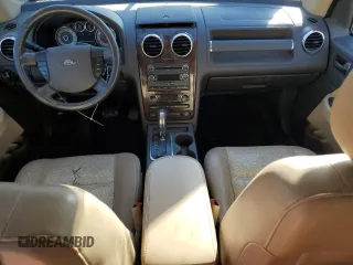 2008 Ford Taurus X Eddie Bauer with VIN 1FMDK07W78GA16734, listed as a Copart auction lot 86011354 with 214,429 mi miles and Salvage title. Bid and sale history available at DreamBid. Image 8.