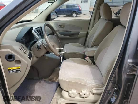 2007 Hyundai Tucson SE with VIN KM8JN12D07U520418, listed as a Copart auction lot 41568235 with 64,256 mi miles and Salvage Title. Bid and sale history available at carsss.com. Image 7.