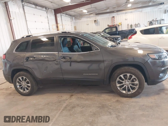 2021 Jeep Cherokee Latitude Lux z VIN 1C4PJMMX5MD194128, wystawiony jako IAAI lot #42257671 z przebiegiem 25 969 mil mil oraz . Historia ofert i sprzedaży dostępna na DreamBid. Obrazek 13.