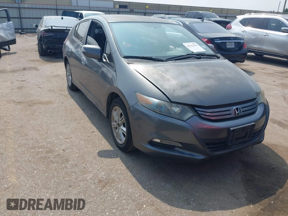 2010 Honda Insight EX with VIN JHMZE2H71AS043465, listed as a IAAI auction lot 42312556 with 151,009 mi miles and . Bid and sale history available at DreamBid. Image 1.