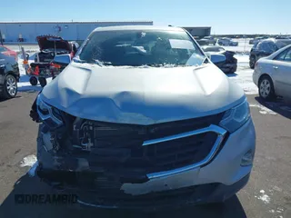 2018 Chevrolet Equinox LT z VIN 2GNAXSEV9J6350260, wystawiony jako IAAI lot #41625613 z przebiegiem 75 317 mil mil oraz . Historia ofert i sprzedaży dostępna na DreamBid. Obrazek 12.