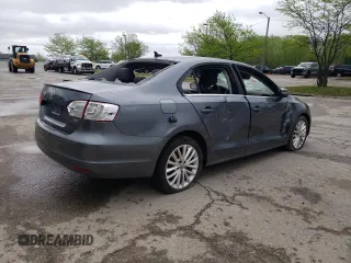 2014 Volkswagen Jetta TDI w/Premium with VIN 3VWLL7AJ1EM428536, listed as a Copart auction lot 53896765 with 75,525 mi miles and Salvage title. Bid and sale history available at DreamBid. Image 3.