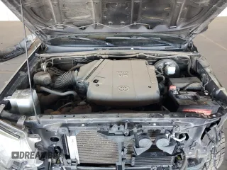 2014 Toyota Tacoma PreRunner z VIN 3TMJU4GN4EM166687, wystawiony jako Copart lot #62021545 z przebiegiem 81 427 mil mil oraz Szkoda całkowita • Salvage title. Historia ofert i sprzedaży dostępna na DreamBid. Obrazek 11.