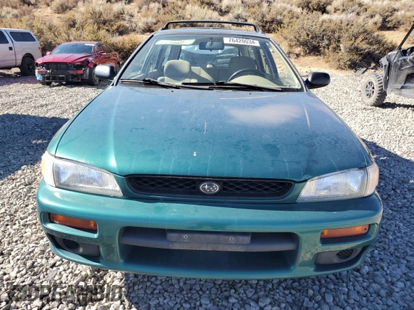 1997 Subaru Impreza L with VIN JF1GF4352VG821519, listed as a Copart auction lot 76420034 with 57,600 mi miles and Clean title. Bid and sale history available at DreamBid. Image 5.
