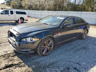 2015 Jaguar XJ with VIN SAJWA2GT8FMV83276, listed as a Copart auction lot 86521754 with 105,010 mi miles and Salvage Title. Bid and sale history available at DreamBid. Image 1.