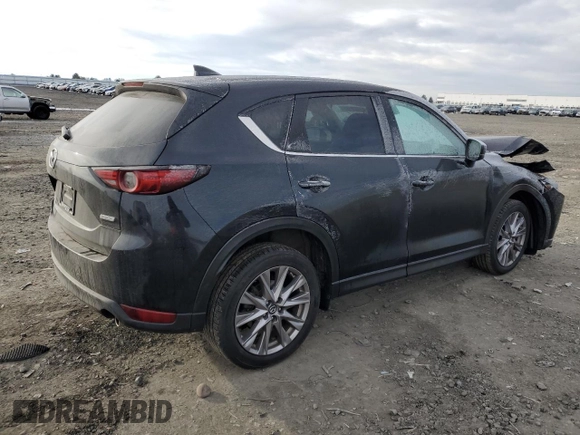 2019 Mazda CX-5 Grand Touring with VIN JM3KFBDM9K1650840, listed as a Copart auction lot 41929185 with 61,814 mi miles and Salvage Title. Bid and sale history available at carsss.com. Image 3.