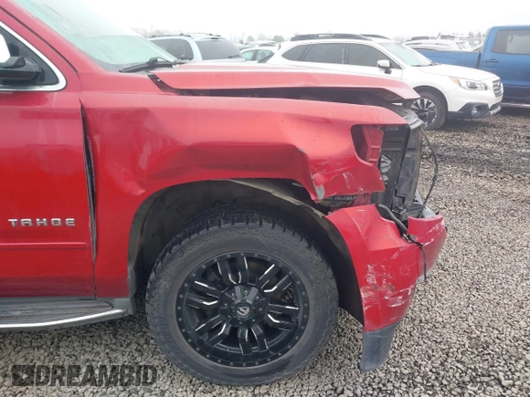 2015 Chevrolet Tahoe LTZ z VIN 1GNSKCKC6FR276531, wystawiony jako IAAI lot #41692617 z przebiegiem 124 010 mil mil oraz . Historia ofert i sprzedaży dostępna na DreamBid. Obrazek 19.