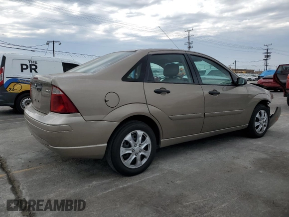 2005 Ford Focus S with VIN 1FAFP34N55W105530, listed as a Copart auction lot 59186695 with 136,204 mi miles and Salvage title. Bid and sale history available at DreamBid. Image 3.