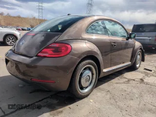 2013 Volkswagen Beetle with VIN 3VWHX7AT8DM603424, listed as a Copart auction lot 51019185 with 136,196 mi miles and Salvage Title. Bid and sale history available at DreamBid. Image 3.