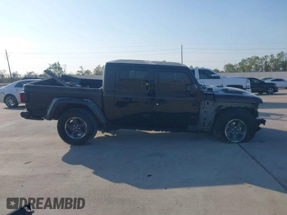 2023 Jeep Gladiator Rubicon z VIN 1C6JJTBGXPL543787, wystawiony jako IAAI lot #40963799 z przebiegiem 5 402 mil mil oraz . Historia ofert i sprzedaży dostępna na DreamBid. Obrazek 14.