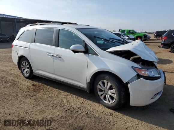 2016 Honda Odyssey with VIN 5FNRL5H62GB143676, listed as a Copart auction lot 54407205 with 113,423 mi miles and Salvage Title. Bid and sale history available at DreamBid. Image 4.