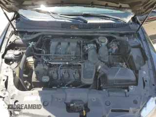 2015 Ford Taurus Limited z VIN 1FAHP2F82FG103711, wystawiony jako Copart lot #57158265 z przebiegiem 205 999 mil mil oraz Szkoda całkowita • Salvage title. Historia ofert i sprzedaży dostępna na DreamBid. Obrazek 11.