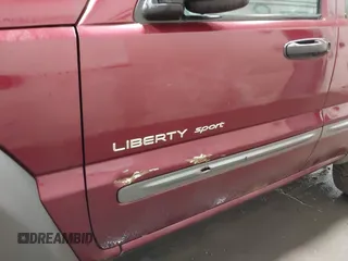 2002 Jeep Liberty Sport with VIN 1J4GL48K72W115630, listed as a IAAI auction lot 41973816 with 154,220 mi miles. Bid and sale history available at carsss.com. Image 6.