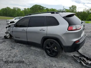 2021 Jeep Cherokee Latitude Plus with VIN 1C4PJLLB8MD112568, listed as a Copart auction lot 53832485 with 128,186 mi miles and Salvage title. Bid and sale history available at DreamBid. Image 2.