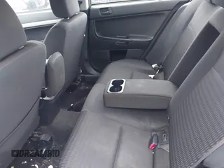 2012 Mitsubishi Lancer ES with VIN JA32U2FU7CU007607, listed as a IAAI auction lot 42576022 with Not provided miles and . Bid and sale history available at DreamBid. Image 8.