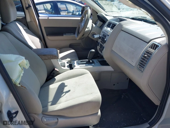 2010 Mercury Mariner with VIN 4M2CN8BG7AKJ01706, listed as a IAAI auction lot 41701667 with 96,189 mi miles. Bid and sale history available at carsss.com. Image 5.