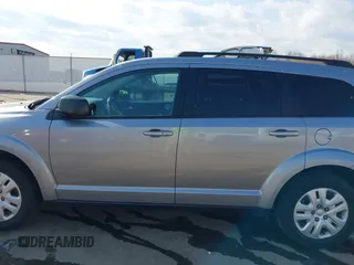 2016 Dodge Journey American Value with VIN 3C4PDCAB3GT234988, listed as a IAAI auction lot 41764190 with 124,077 mi miles and . Bid and sale history available at DreamBid. Image 14.
