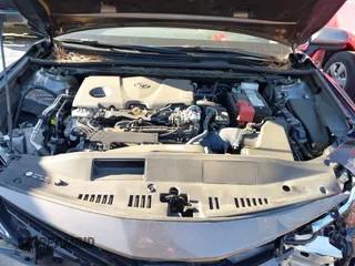 2024 Toyota Camry LE z VIN 4T1C11AK3RU847743, wystawiony jako IAAI lot #41886636 z przebiegiem 22 814 mil mil oraz . Historia ofert i sprzedaży dostępna na DreamBid. Obrazek 10.