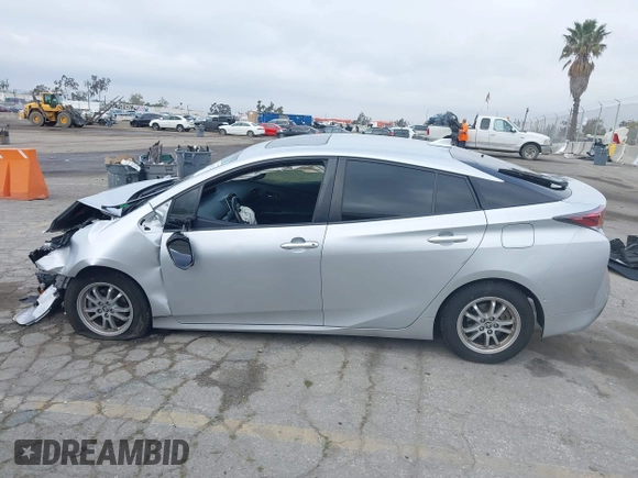 2018 Toyota Prius Two with VIN JTDKARFU0J3056217, listed as a IAAI auction lot 42185122 with 52,344 mi miles and . Bid and sale history available at DreamBid. Image 15.