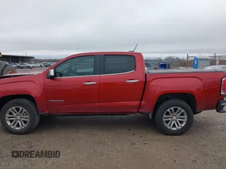 2015 GMC Canyon 2WD SLT with VIN 1GTG5CE3XF1211164, listed as a IAAI auction lot 41490387 with 163,932 mi miles. Bid and sale history available at carsss.com. Image 14.