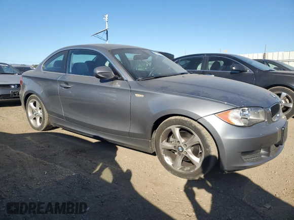 2010 BMW 1 Series 128i with VIN WBAUP9C54AVL89302, listed as a Copart auction lot 76716114 with 65,882 mi miles and Salvage Title. Bid and sale history available at DreamBid. Image 4.