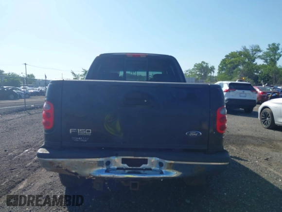 2003 Ford F-150 XLT with VIN 1FTRW08L63KC51053, listed as a IAAI auction lot 42538965 with 167,383 mi miles and . Bid and sale history available at DreamBid. Image 16.