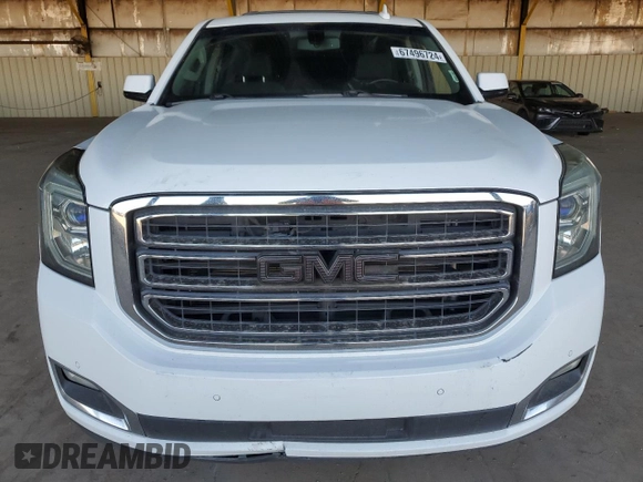 2017 GMC Yukon XL SLE with VIN 1GKS1FKC8HR222023, listed as a Copart auction lot 67496724 with 125,155 mi miles and Salvage Title. Bid and sale history available at carsss.com. Image 5.