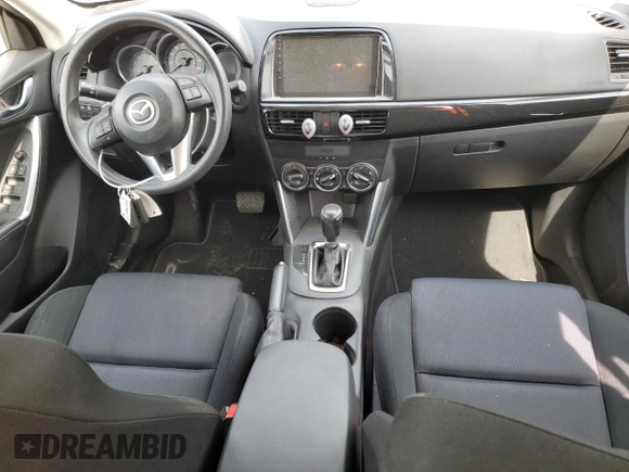 2015 Mazda CX-5 Sport z VIN JM3KE2BE8F0434116, wystawiony jako Copart lot #60712625 z przebiegiem 300 405 mil mil oraz Szkoda całkowita • Salvage title. Historia ofert i sprzedaży dostępna na DreamBid. Obrazek 8.