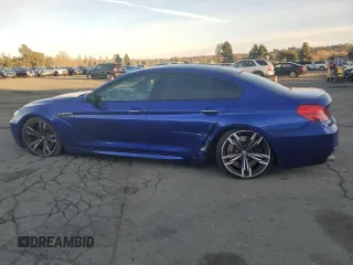 2014 BMW M6 z VIN WBS6C9C5XEDV73722, wystawiony jako Copart lot #87202664 z przebiegiem 68 283 mil mil oraz Szkoda całkowita • Salvage title. Historia ofert i sprzedaży dostępna na DreamBid. Obrazek 2.
