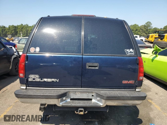 1999 GMC Suburban z VIN 3GKFK16R2XG544767, wystawiony jako Copart lot #67078414 z przebiegiem 154 145 mil mil oraz Szkoda całkowita • Salvage title. Historia ofert i sprzedaży dostępna na DreamBid. Obrazek 6.
