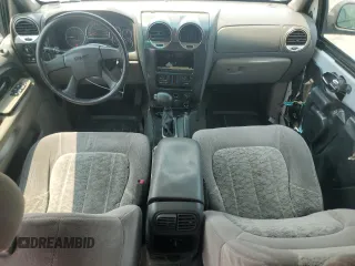 2003 GMC Envoy SLE z VIN 1GKDT13S732228585, wystawiony jako Copart lot #58764565 z przebiegiem 151 107 mil mil oraz Szkoda całkowita • Salvage title. Historia ofert i sprzedaży dostępna na DreamBid. Obrazek 8.