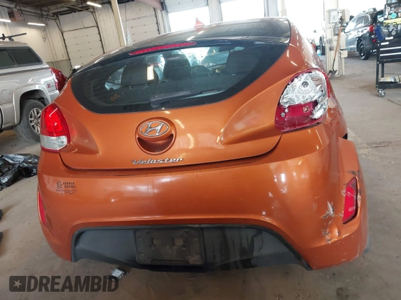 2013 Hyundai Veloster w/Black Int z VIN KMHTC6AD3DU143656, wystawiony jako IAAI lot #42139839 z przebiegiem 121 392 mil mil oraz . Historia ofert i sprzedaży dostępna na DreamBid. Obrazek 16.
