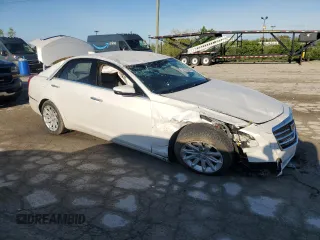 2015 Cadillac CTS RWD with VIN 1G6AP5SXXF0136820, listed as a Copart auction lot 54666385 with 129,763 mi miles and Clean title. Bid and sale history available at DreamBid. Image 4.
