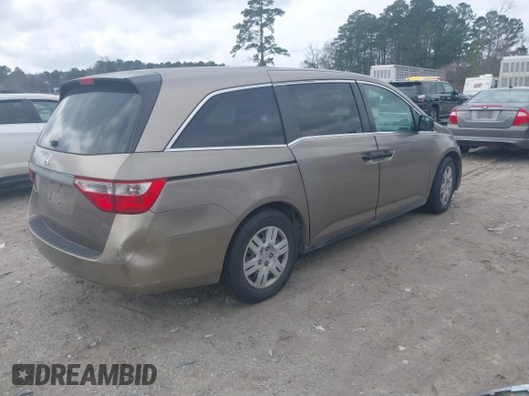 2012 Honda Odyssey LX z VIN 5FNRL5H25CB019912, wystawiony jako IAAI lot #41458224 z przebiegiem 158 980 mil mil oraz . Historia ofert i sprzedaży dostępna na DreamBid. Obrazek 4.