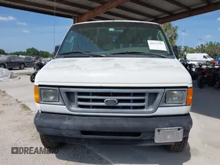 2003 Ford Econoline Passenger XL with VIN 1FBSS31L93HB99802, listed as a IAAI auction lot 42137197 with 56,656 mi miles. Bid and sale history available at carsss.com. Image 6.
