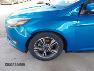 2016 Ford Focus SE with VIN 1FADP3FE3GL226145, listed as a IAAI auction lot 42166519 with 85,769 mi miles. Bid and sale history available at carsss.com. Image 6.