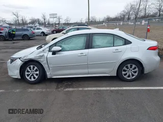 2022 Toyota Corolla LE with VIN JTDEPMAEXN3011631, listed as a IAAI auction lot 41727267 with 64,145 mi miles and . Bid and sale history available at DreamBid. Image 13.