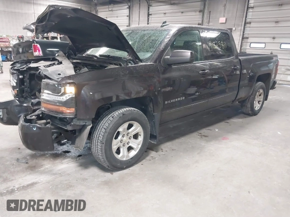 2016 Chevrolet Silverado 1500 LT with VIN 3GCUKRECXGG216804, listed as a IAAI auction lot 41825811 with 127,217 mi miles and . Bid and sale history available at DreamBid. Image 2.