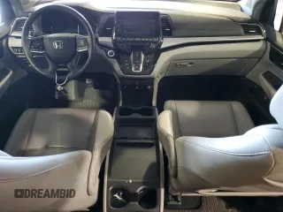 2021 Honda Odyssey Touring with VIN 5FNRL6H84MB009125, listed as a Copart auction lot 58248385 with 55,360 mi miles and Salvage title. Bid and sale history available at DreamBid. Image 8.