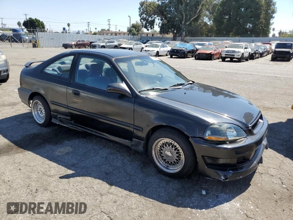 1997 Honda Civic DX with VIN 1HGEJ6128VL083271, listed as a Copart auction lot 72088024 with 329,655 mi miles and Salvage Title. Bid and sale history available at carsss.com. Image 4.