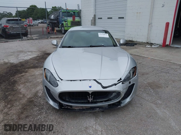 2013 Maserati GranTurismo Sport with VIN ZAM45VLA8D0072490, listed as a IAAI auction lot 42438872 with 84,214 mi miles and . Bid and sale history available at DreamBid. Image 12.