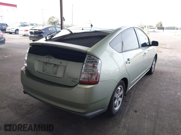 2007 Toyota Prius with VIN JTDKB20U077578859, listed as a IAAI auction lot 41985697 with 185,897 mi miles and . Bid and sale history available at DreamBid. Image 4.