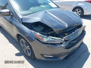 2018 Ford Focus SE with VIN 1FADP3FE3JL204220, listed as a IAAI auction lot 41972960 with 62,682 mi miles and . Bid and sale history available at DreamBid. Image 18.